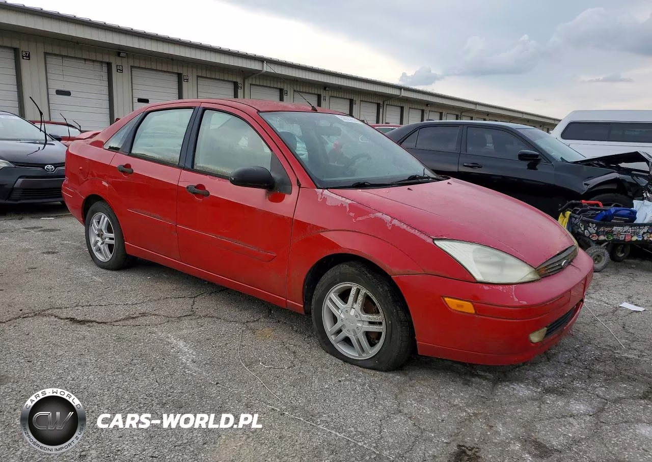 2004 Ford Focus VIN:1FAFP343X1W230211 - 4