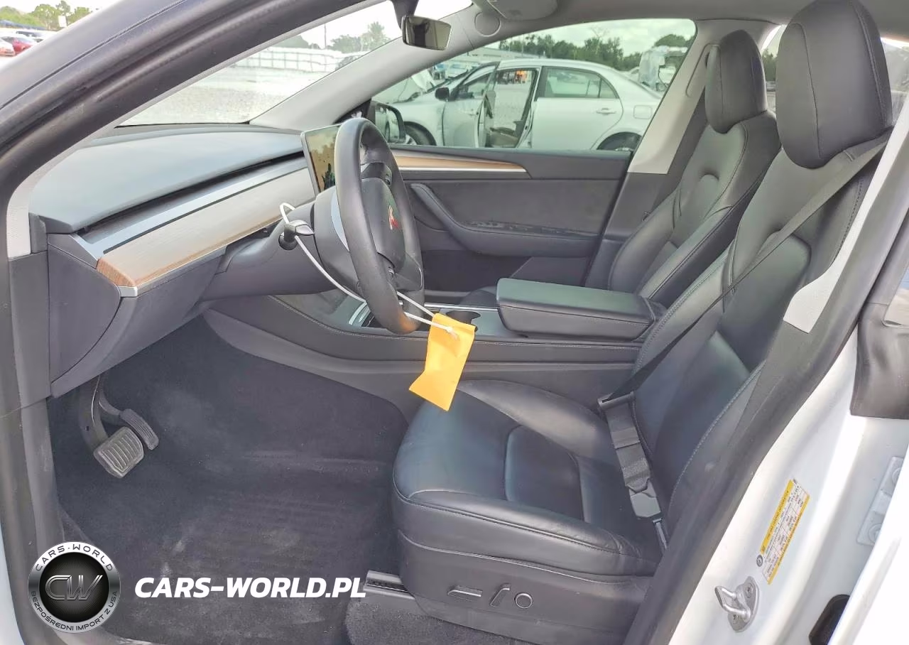 2023 Tesla Model Y VIN:7SAYGDEE4PF608631 - 7