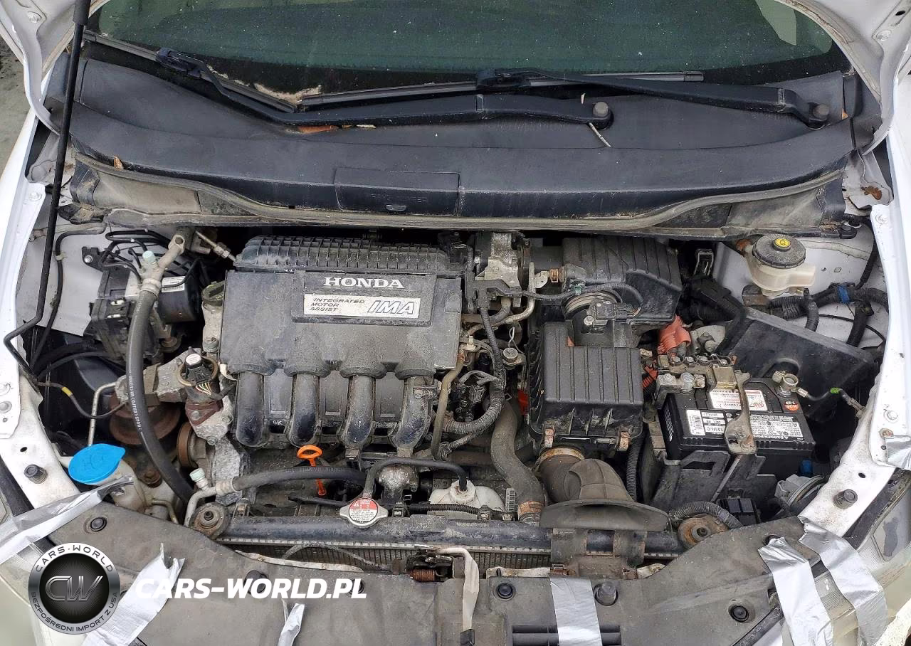 2010 Honda Insight VIN:JHMZE2H72AS007073 - 11