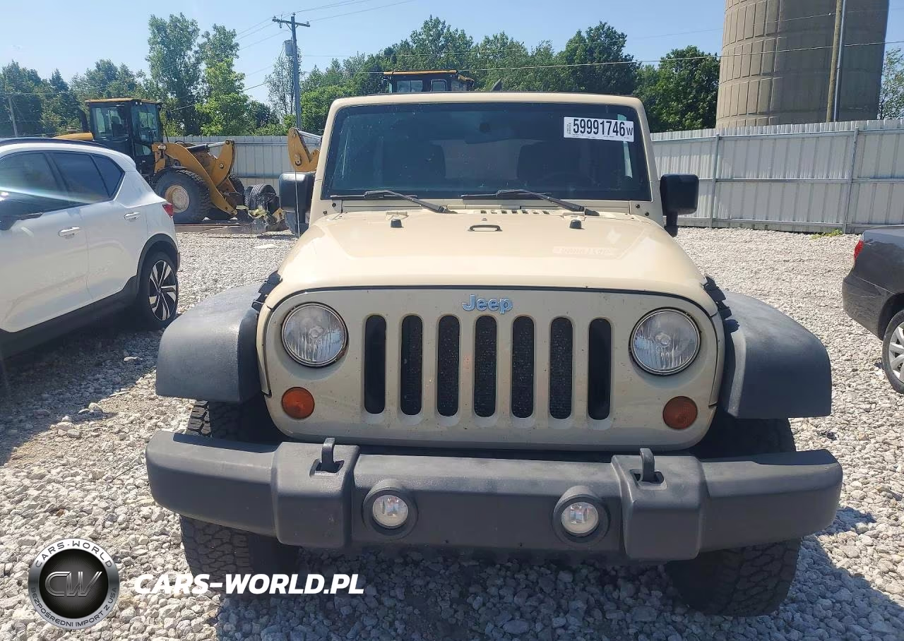 2011 Jeep Wrangler Unlimited Rubicon VIN:1J4BA6H13BL598053 - 5