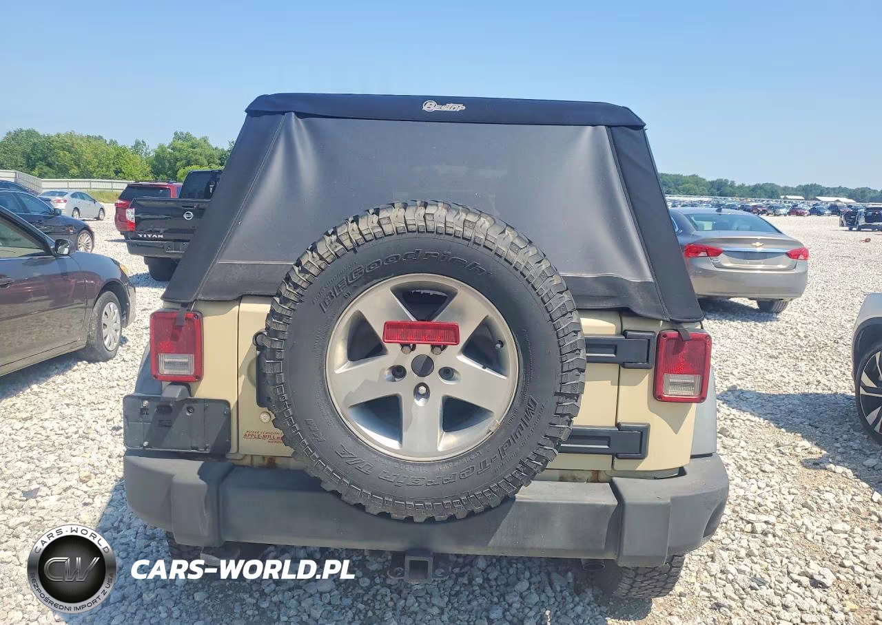 2011 Jeep Wrangler Unlimited Rubicon VIN:1J4BA6H13BL598053 - 6