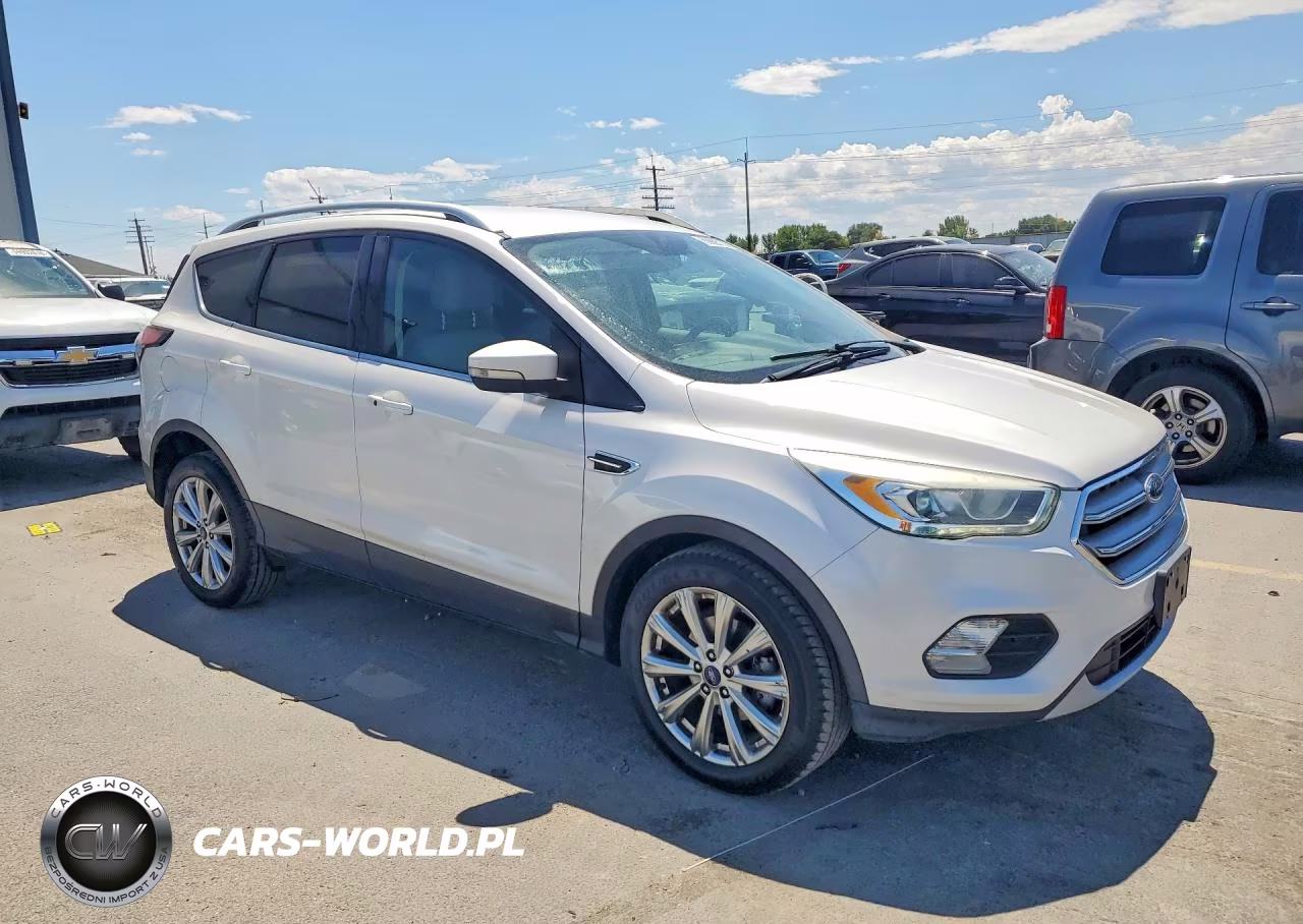 2017 Ford Escape Titanium VIN:1FMCU0JD6HUC14042 - 4