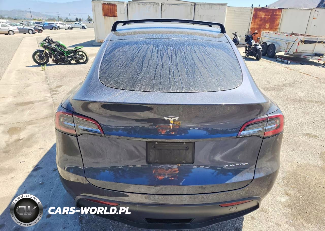 2023 Tesla Model Y VIN:7SAYGDEEXPF928052 - 6