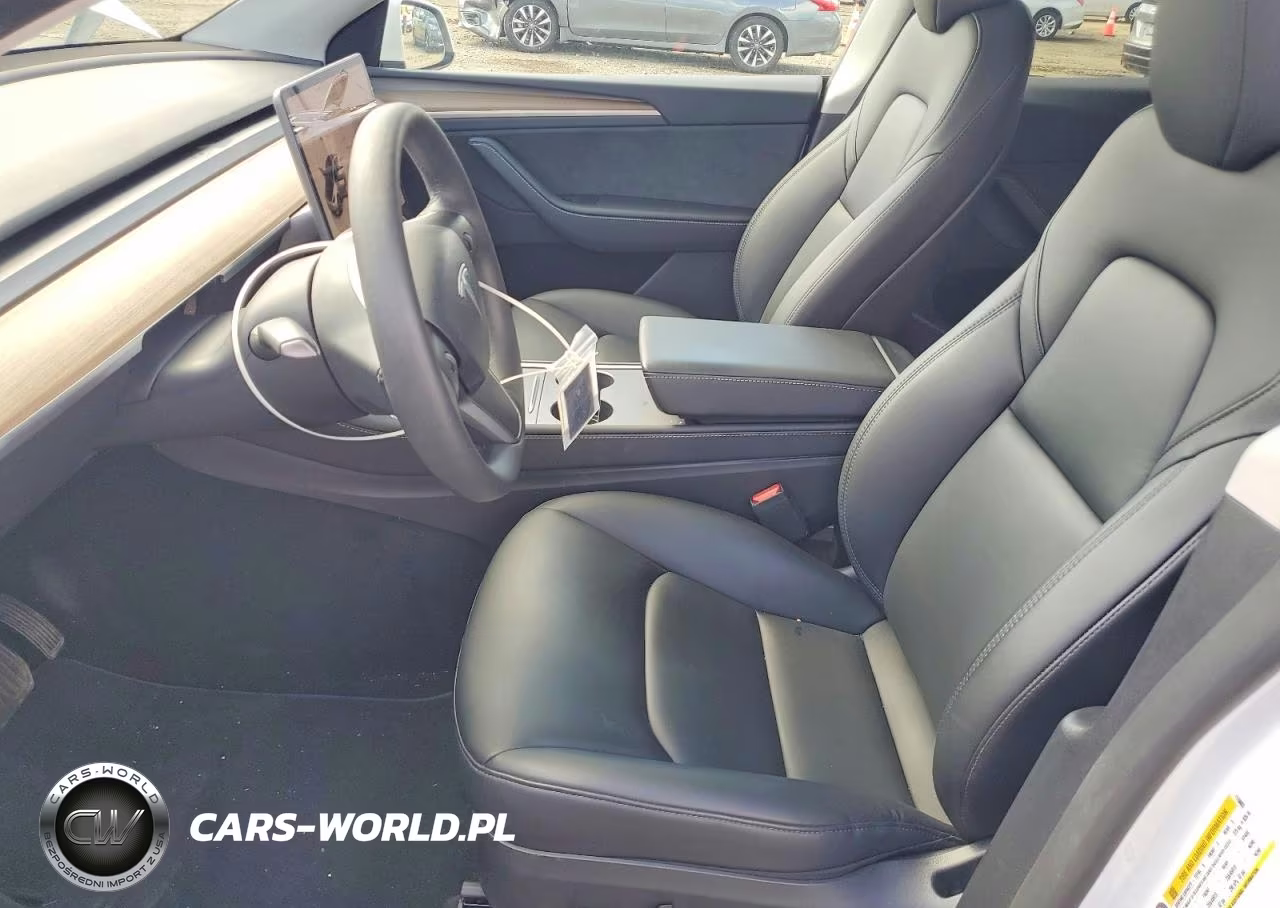 2023 Tesla Model Y VIN:7SAYGDEE2PA115883 - 7