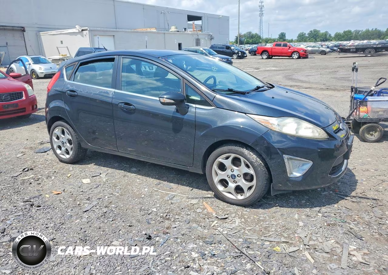 2011 Ford Fiesta Ses VIN:3FADP4FJ2BM134471 - 4