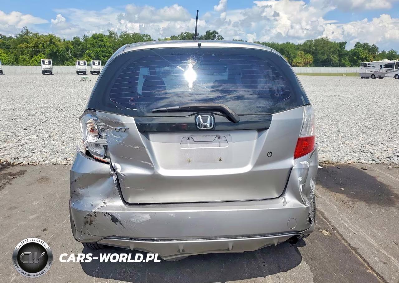 2010 Honda Fit VIN:JHMGE8H29AS017520 - 6