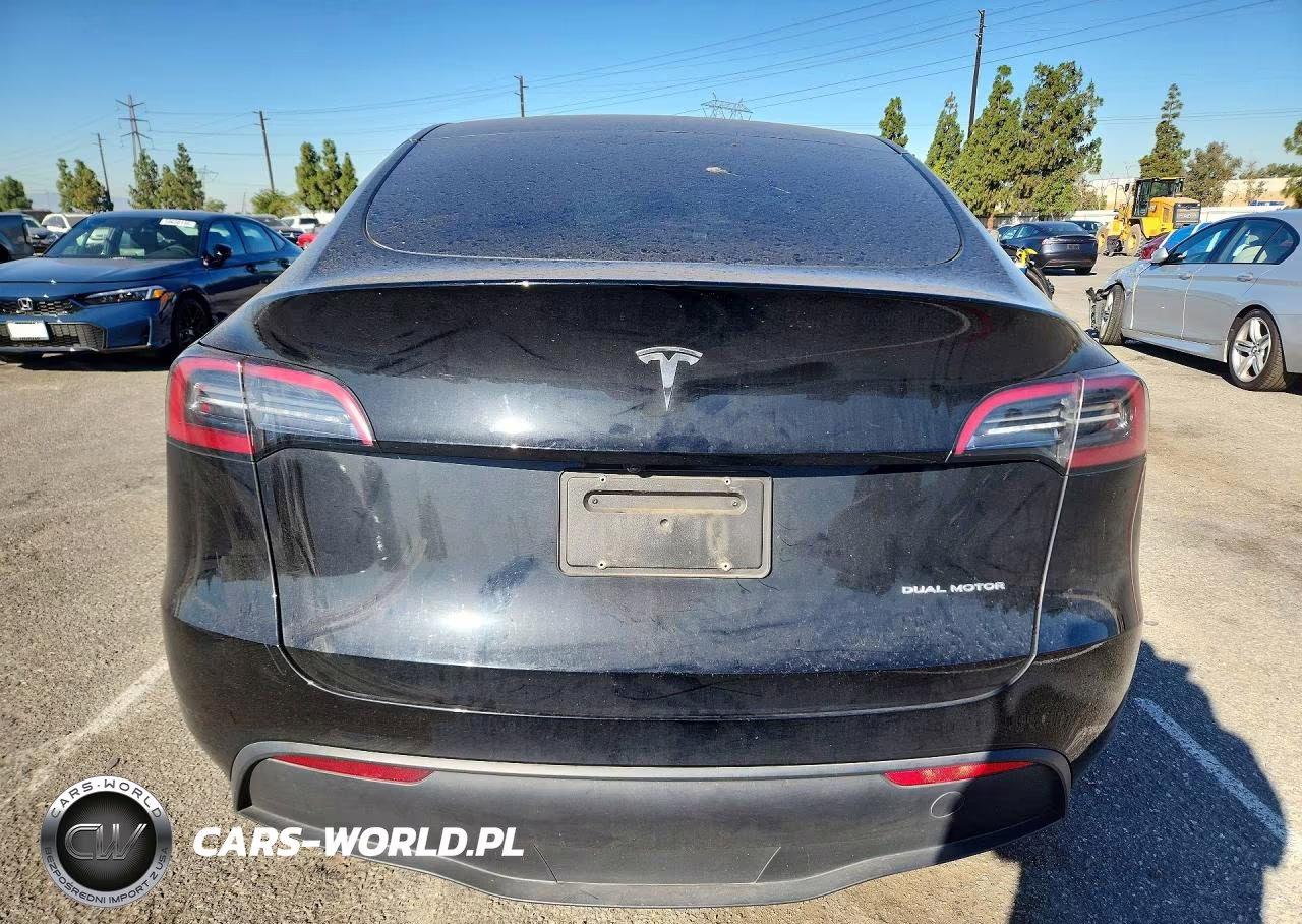 2023 Tesla Model Y VIN:7SAYGDEE4PF867653 - 6