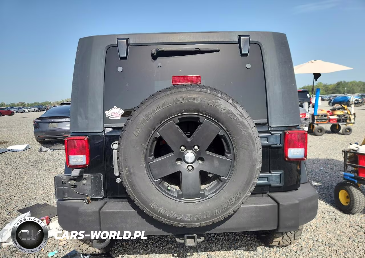 2009 Jeep Wrangler Sahara VIN:1J4FA54149L749140 - 6