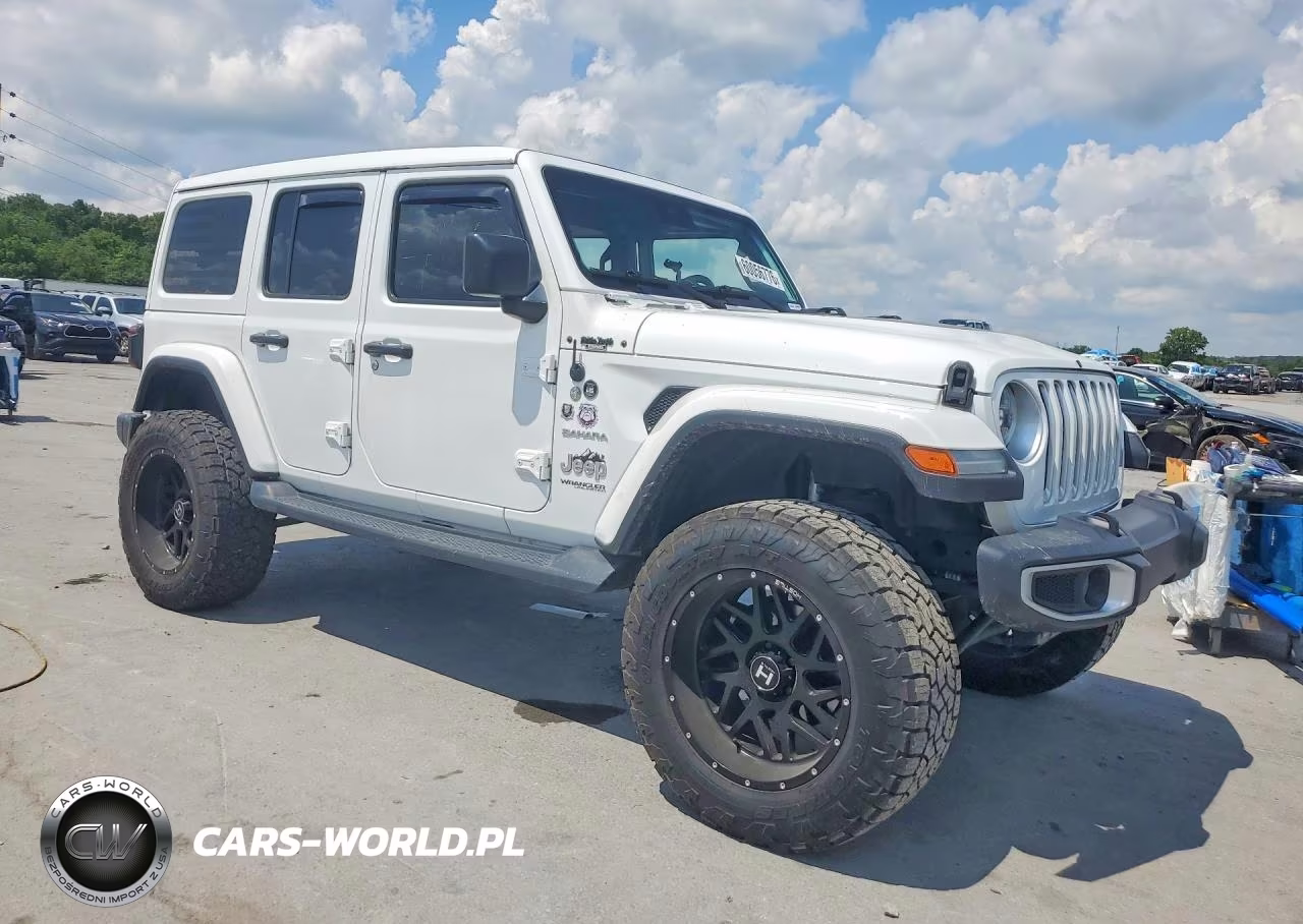 2019 Jeep Wrangler Unlimited Sahara VIN:1C4HJXEN3KW535434 - 4