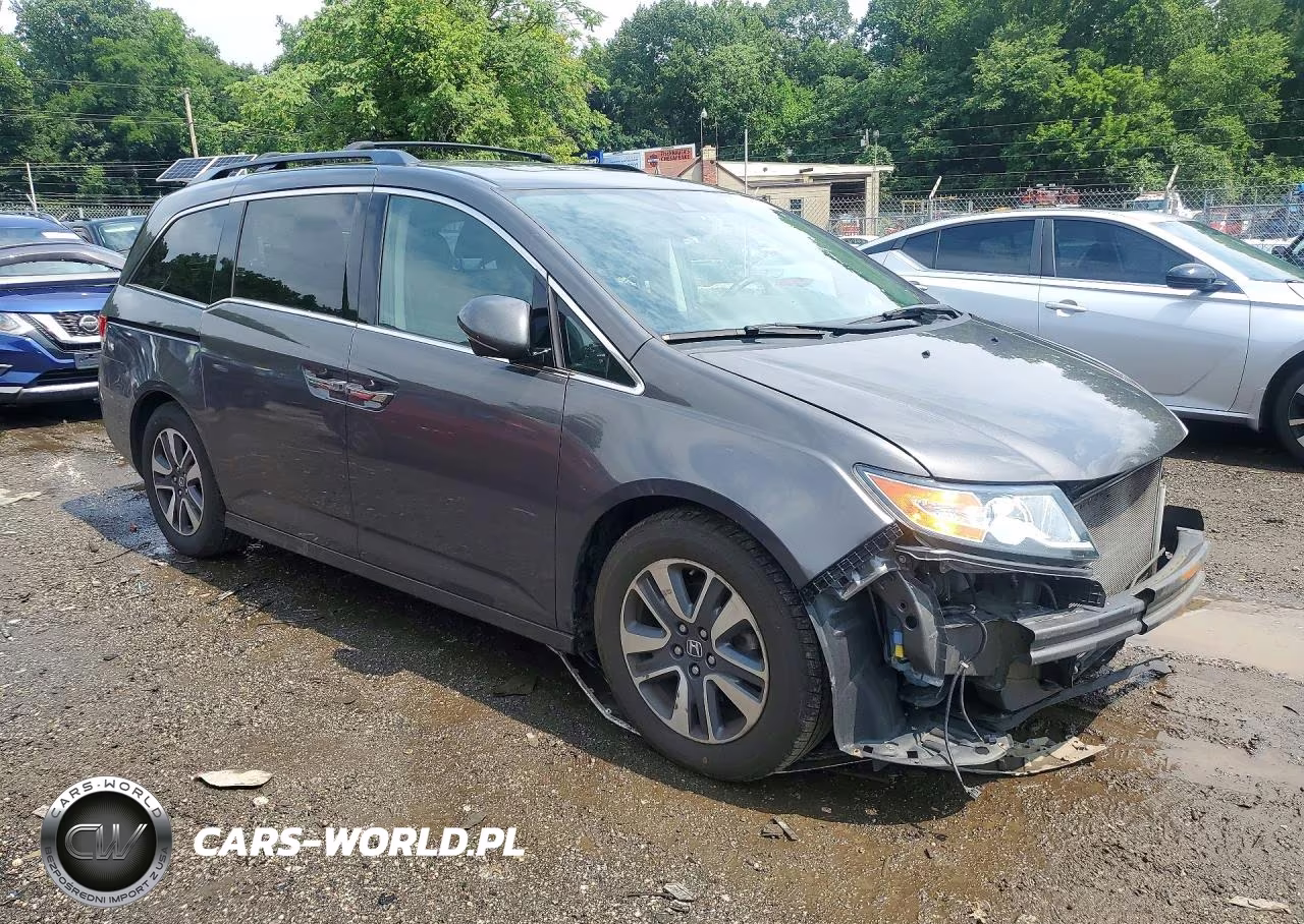 2014 Honda Odyssey Touring VIN:5FNRL5H91EB031507 - 4