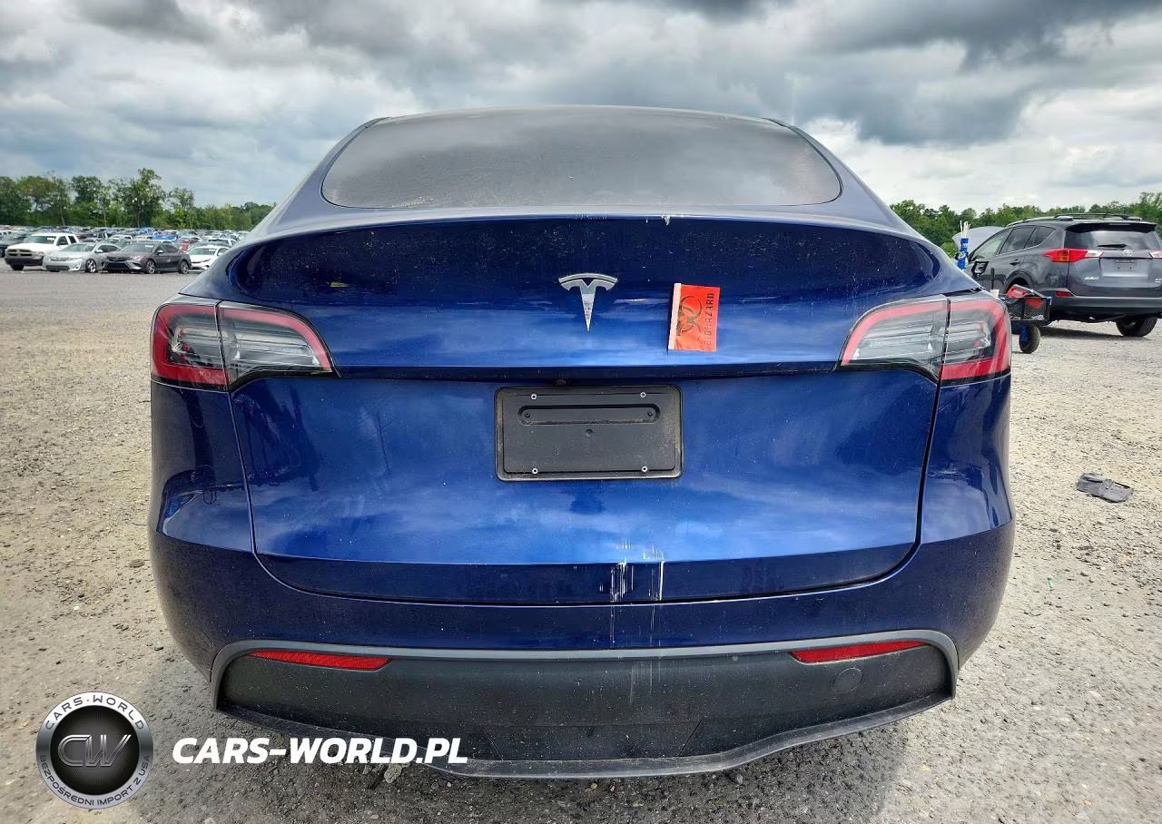 2023 Tesla Model Y VIN:7SAYGDED9PF945707 - 6