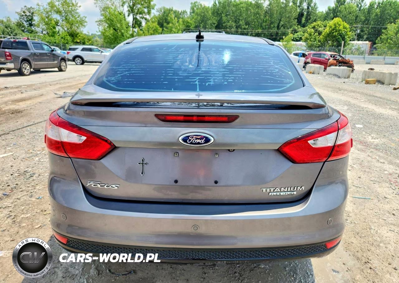 2013 Ford Focus Titanium VIN:1FADP3J23DL299881 - 6