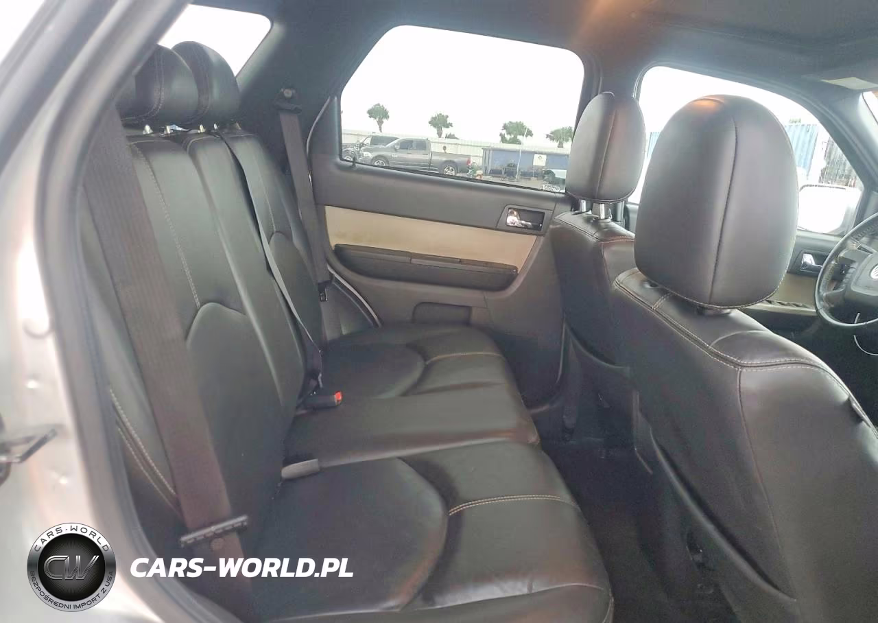 2009 Mercury Mariner Premier VIN:4M2CU97719KJ16909 - 10