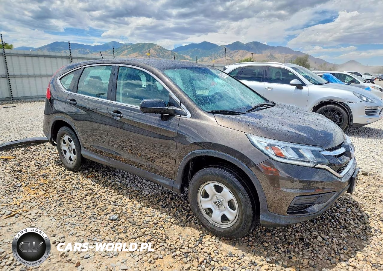 2015 Honda Cr-V Lx VIN:2HKRM3H32FH552395 - 4