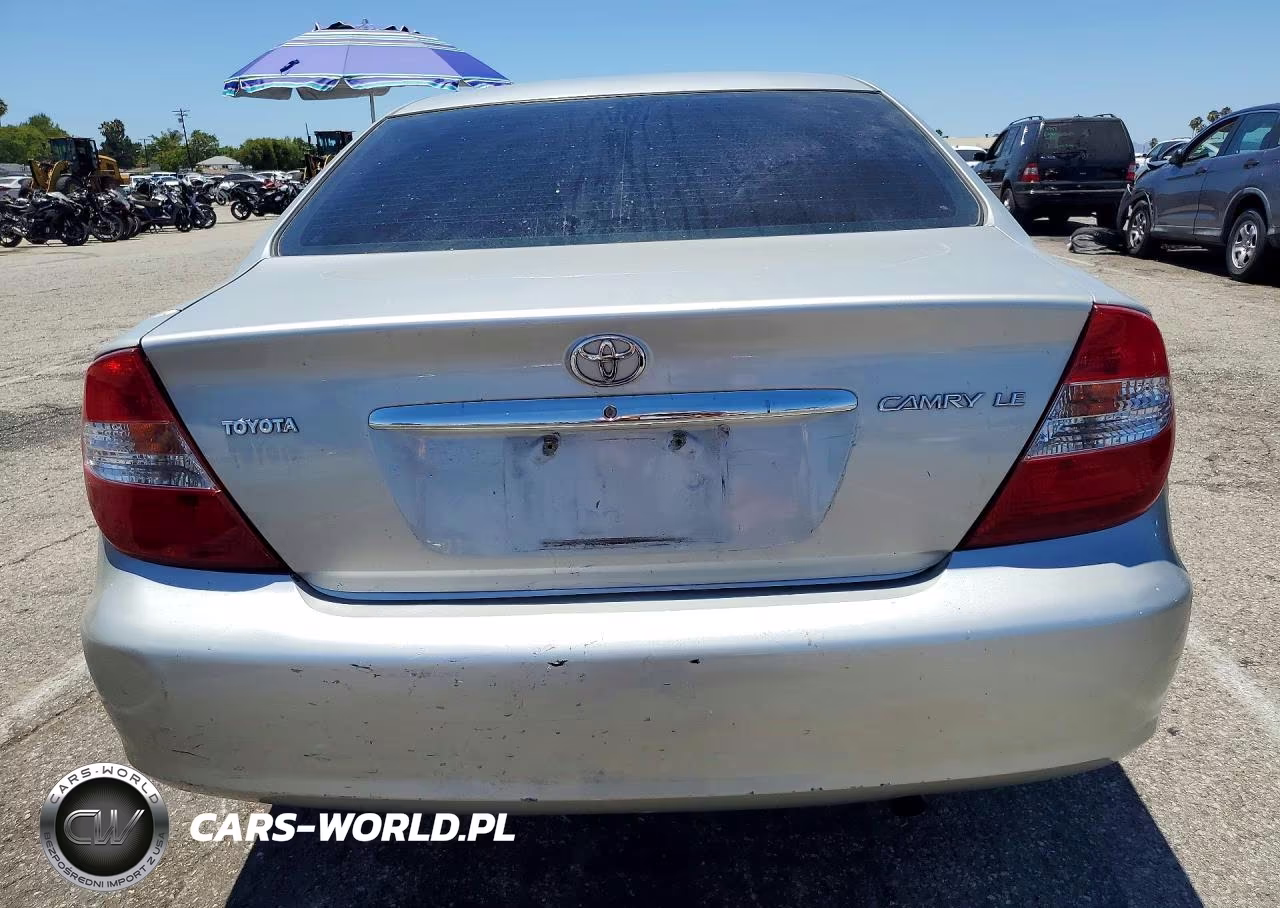 2002 Toyota Camry Le VIN:JTDBE32K720038502 - 6