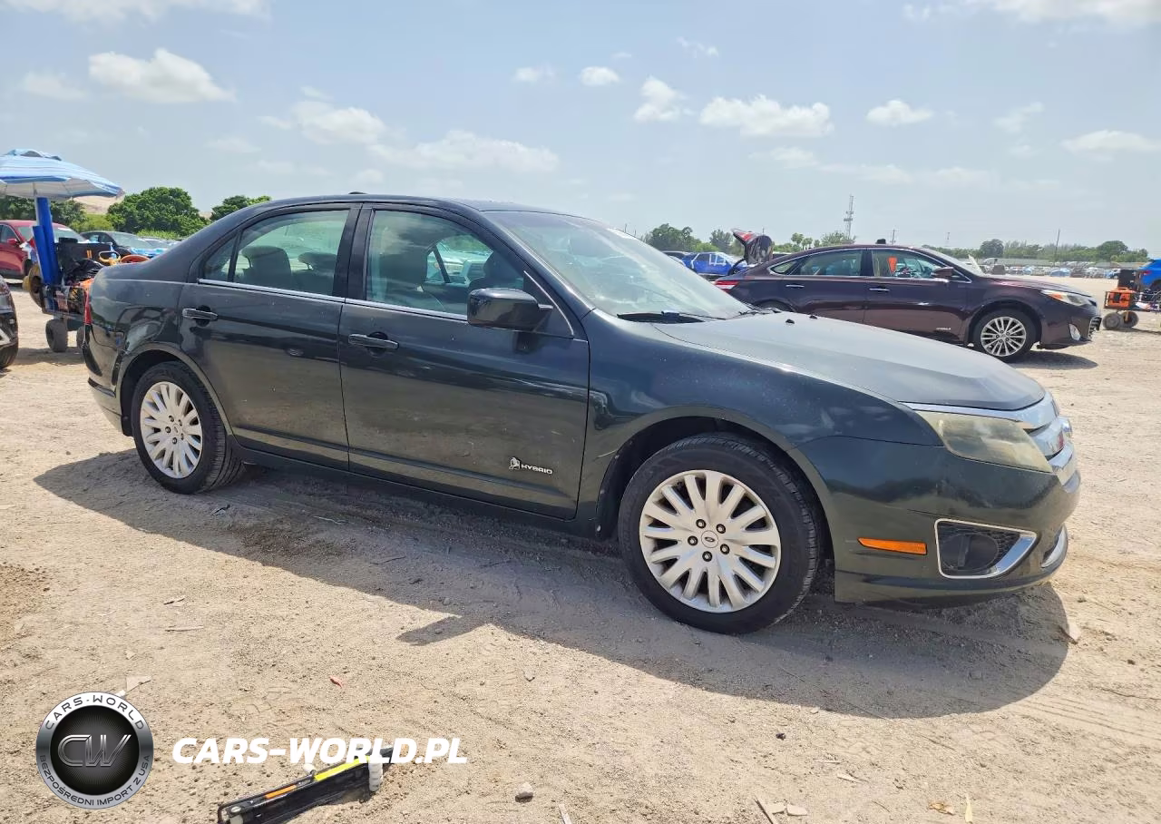 2010 Ford Fusion Hybrid VIN:3FADP0L38AR164140 - 4