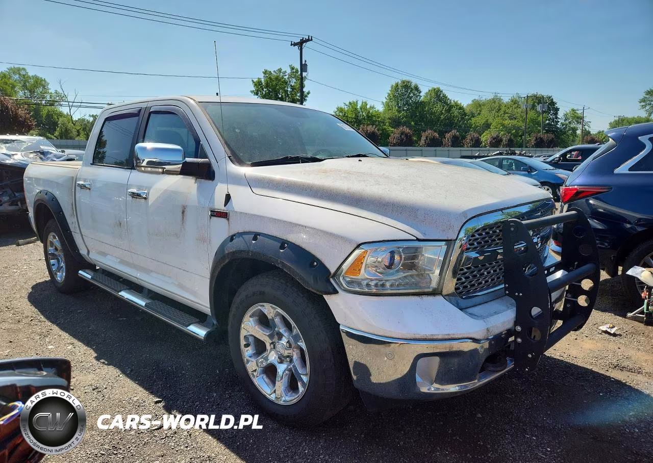 2015 Ram 1500 Laramie VIN:1C6RR7NMXFS531616 - 4