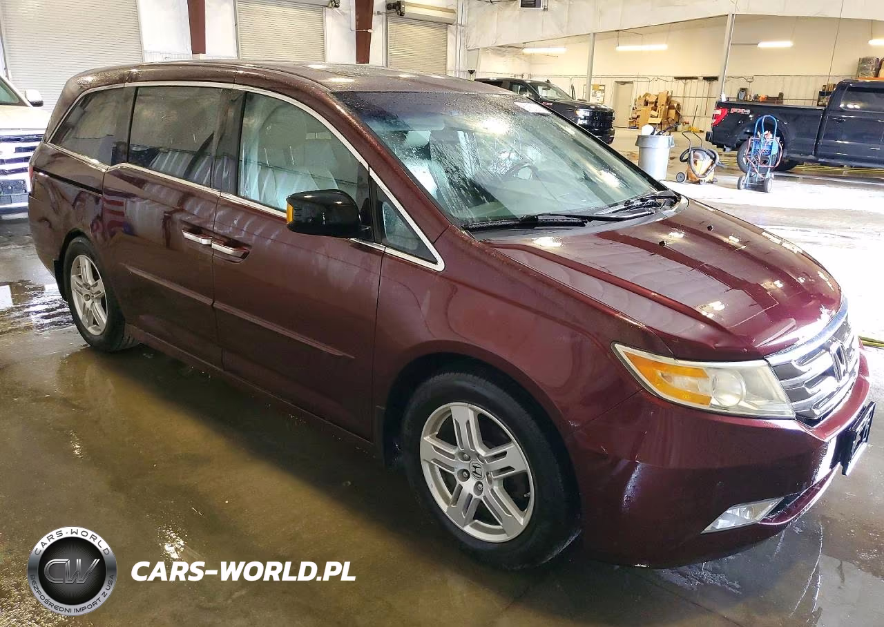 2011 Honda Odyssey Touring VIN:5FNRL5H95BB018335 - 4