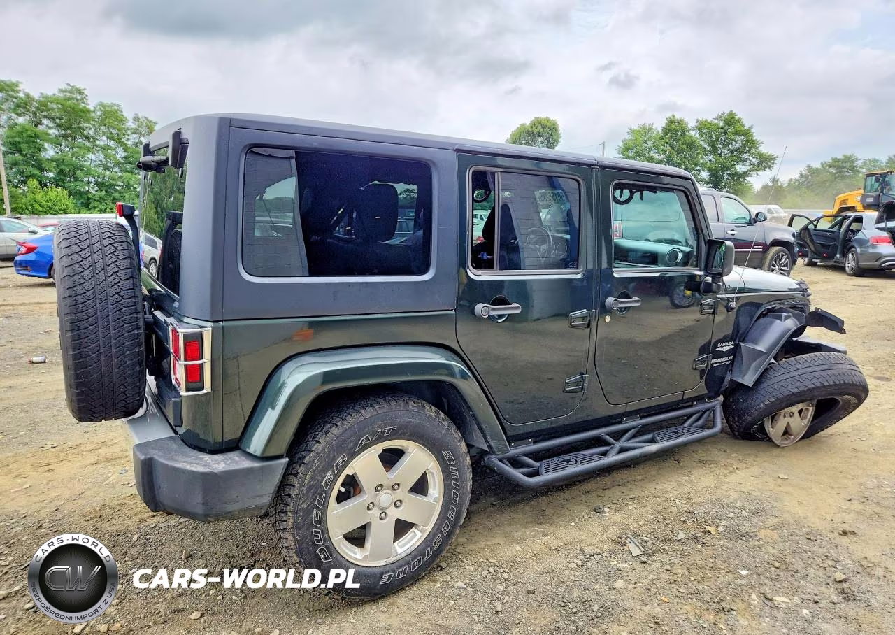 2011 Jeep Wrangler Unlimited Sahara VIN:1J4BA5H1XBL532660 - 3