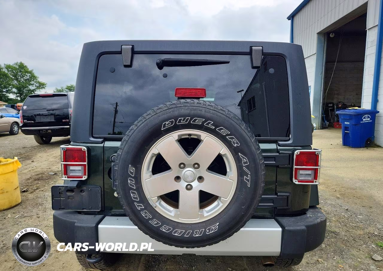2011 Jeep Wrangler Unlimited Sahara VIN:1J4BA5H1XBL532660 - 6