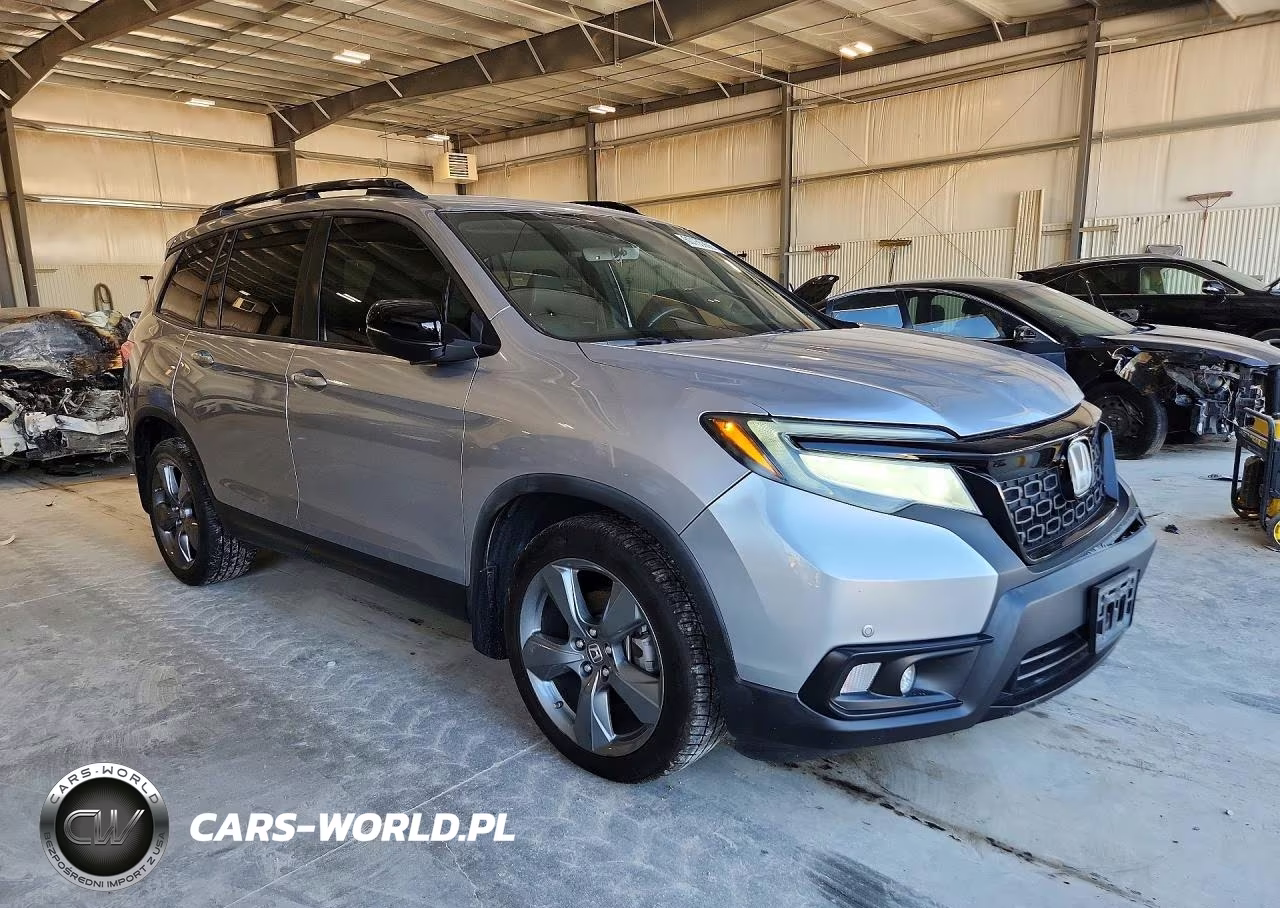 2019 Honda Passport Touring VIN:5FNYF7H97KB000403 - 4