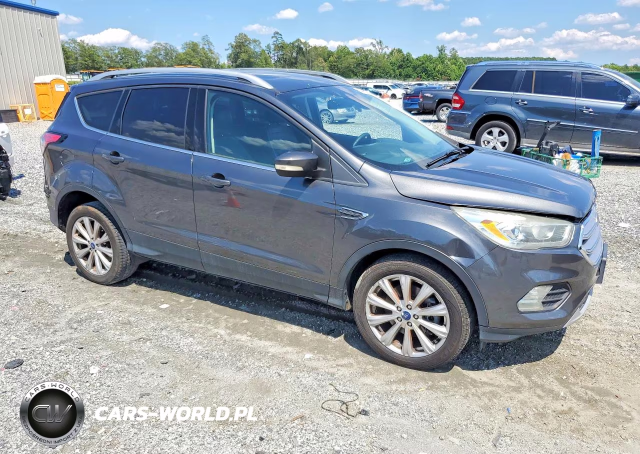 2017 Ford Escape Titanium VIN:1FMCU9J98HUD56814 - 4
