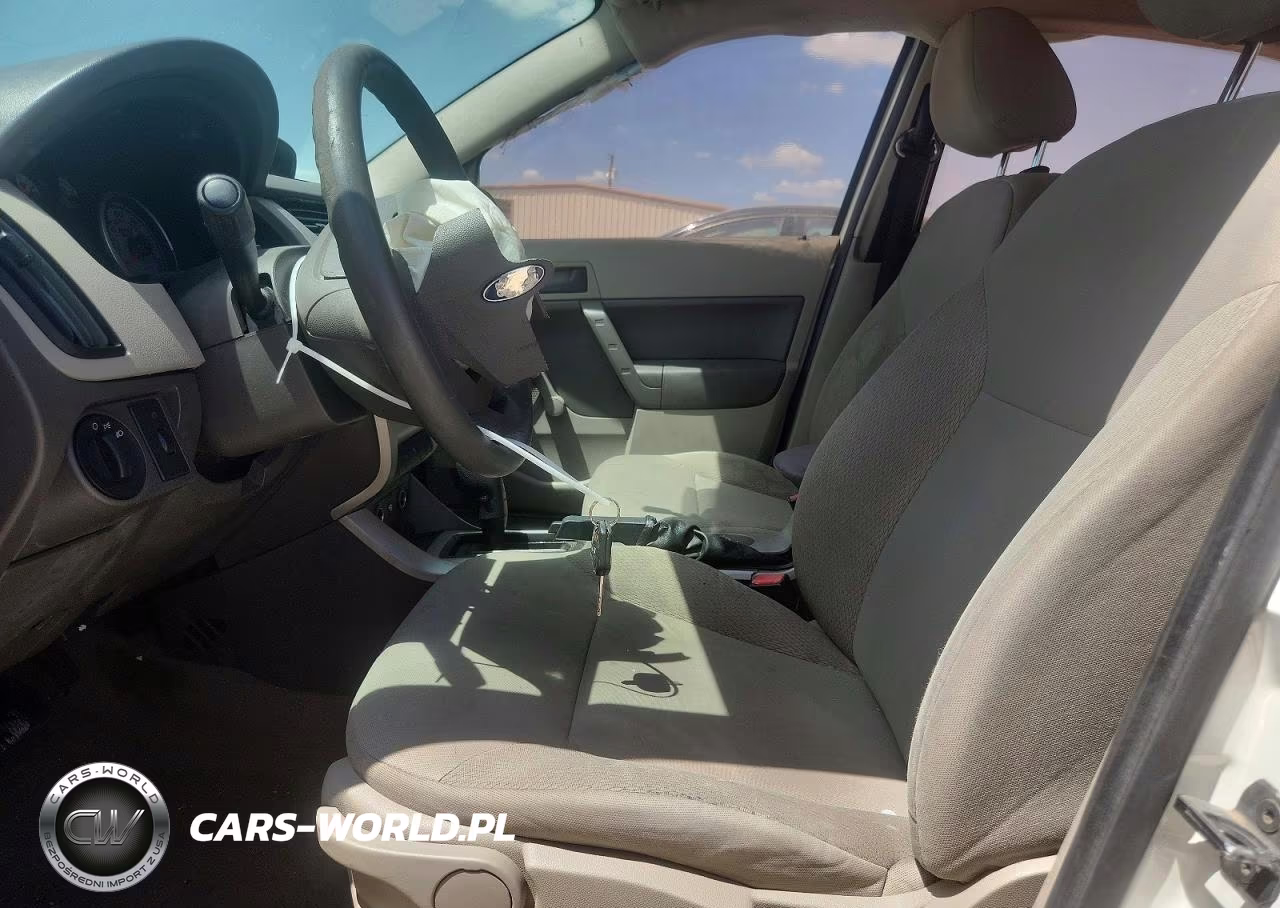 2010 Ford Focus S VIN:1FAHP3EN0AW262609 - 7