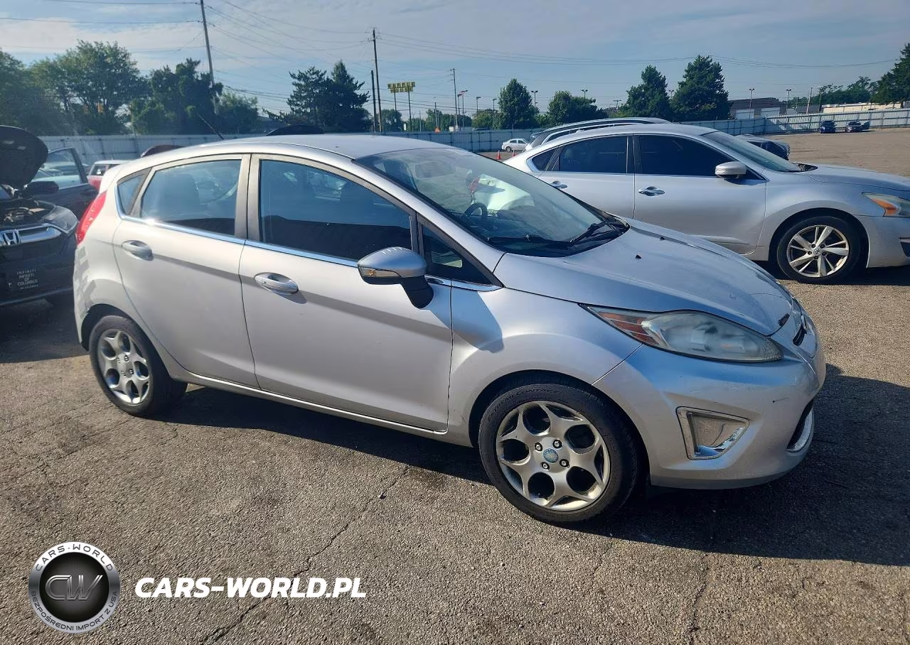 2011 Ford Fiesta Ses VIN:3FADP4FJ8BM179320 - 4