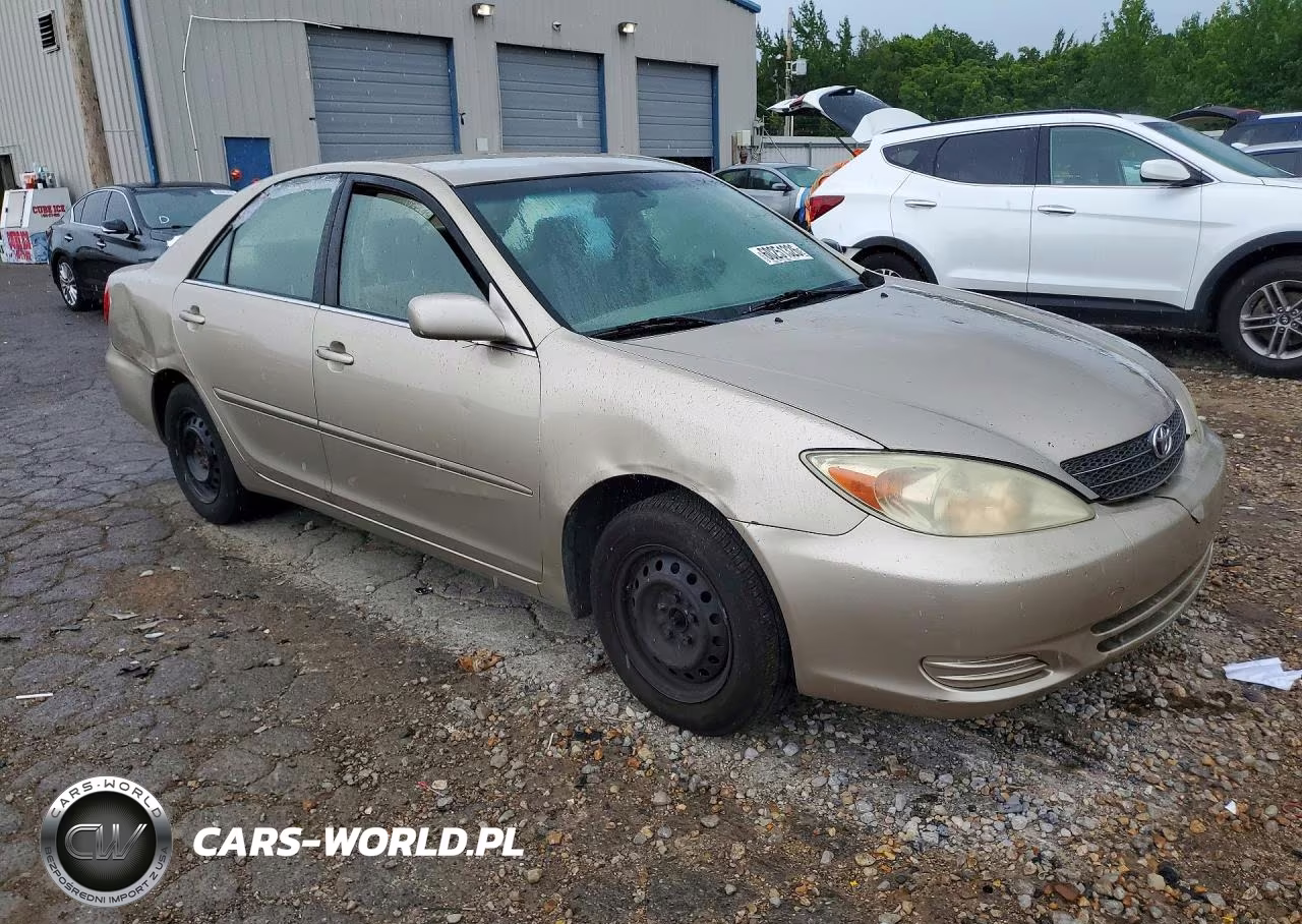 2003 Toyota Camry Le VIN:JTDBE32K030193863 - 4