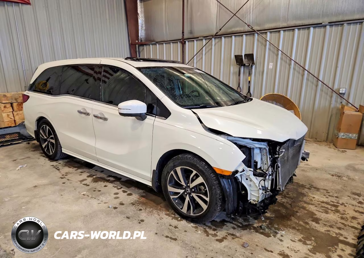 2018 Honda Odyssey Elite VIN:5FNRL6H99JB062570 - 4