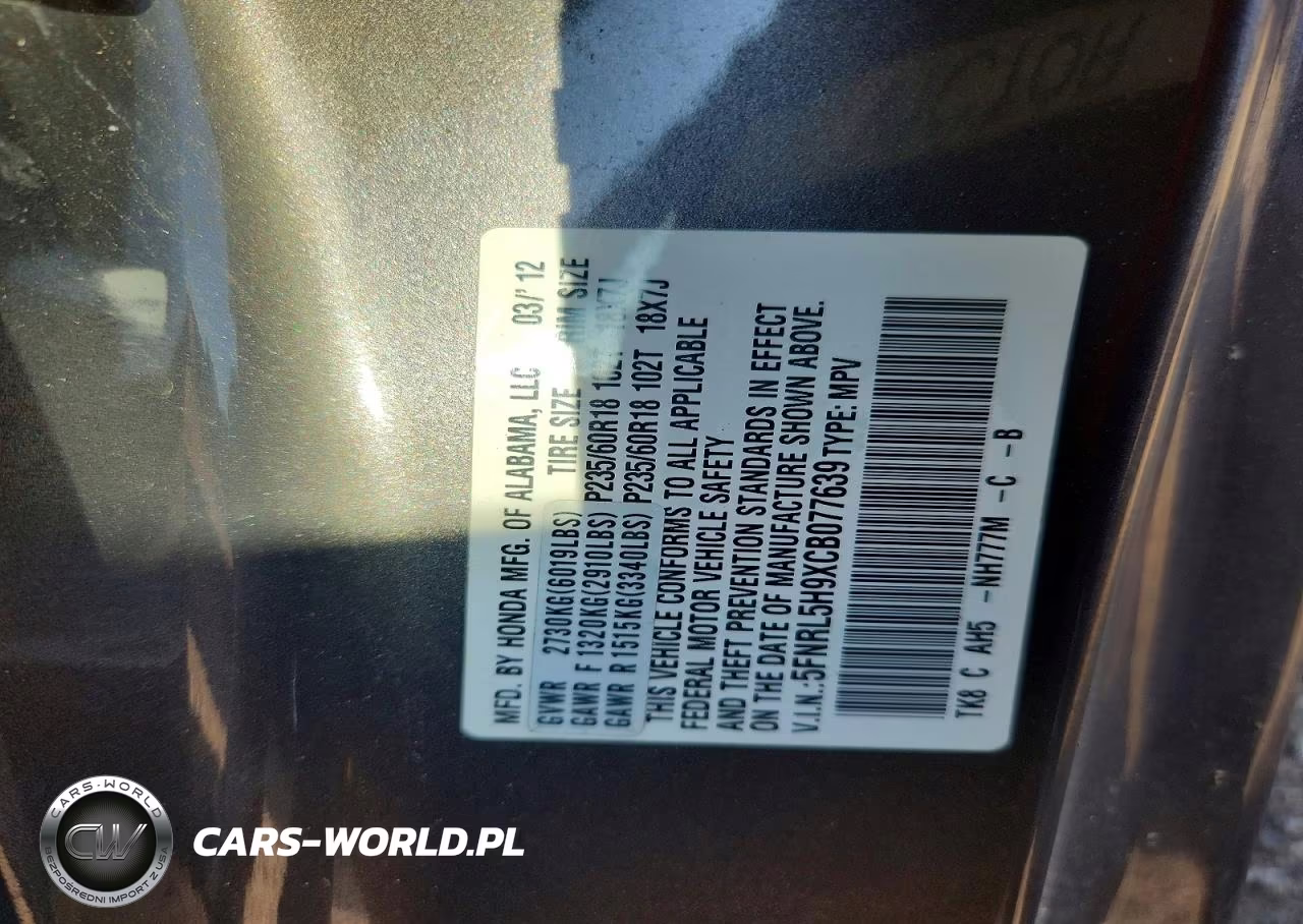 2012 Honda Odyssey Touring VIN:5FNRL5H9XCB077639 - 12