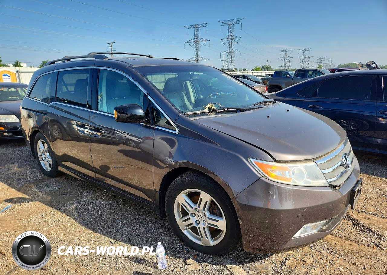 2012 Honda Odyssey Touring VIN:5FNRL5H9XCB077639 - 4