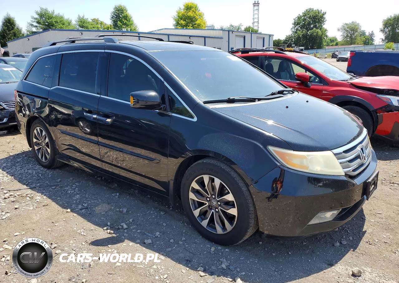 2011 Honda Odyssey Touring VIN:5FNRL5H97BB057234 - 4
