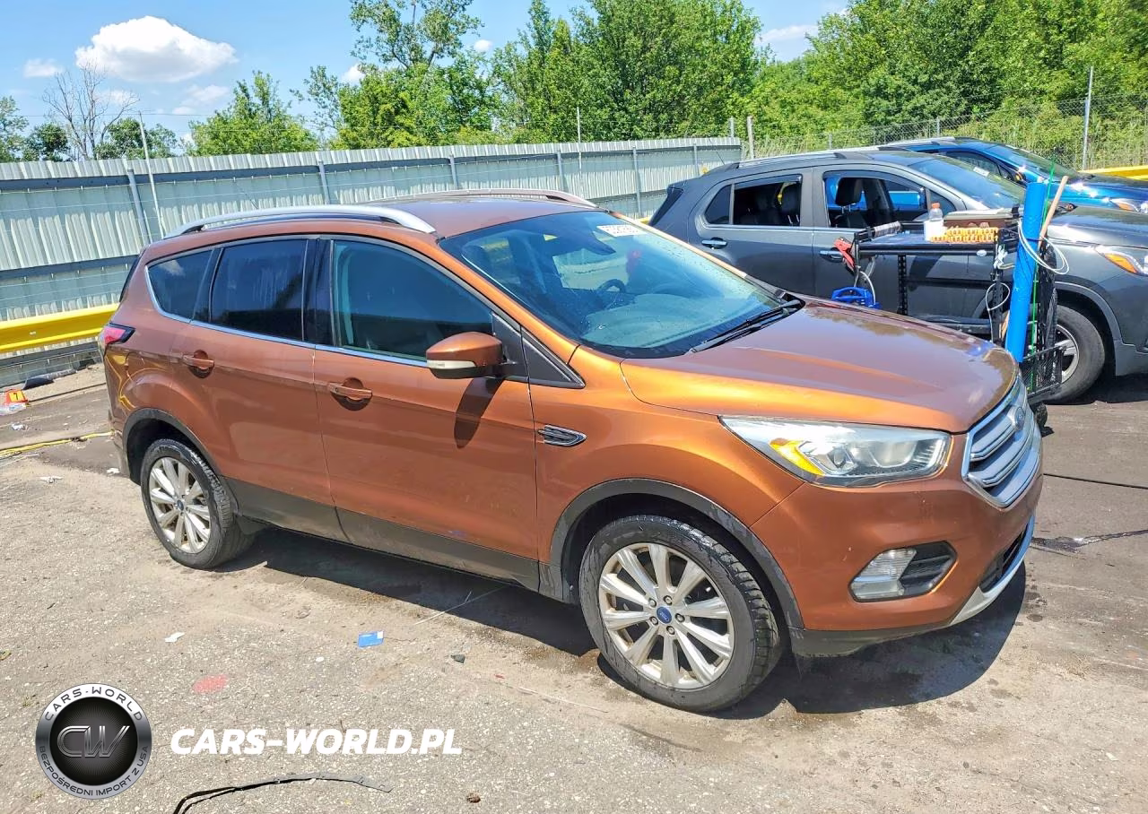 2017 Ford Escape Titanium VIN:1FMCU0J99HUD51357 - 4