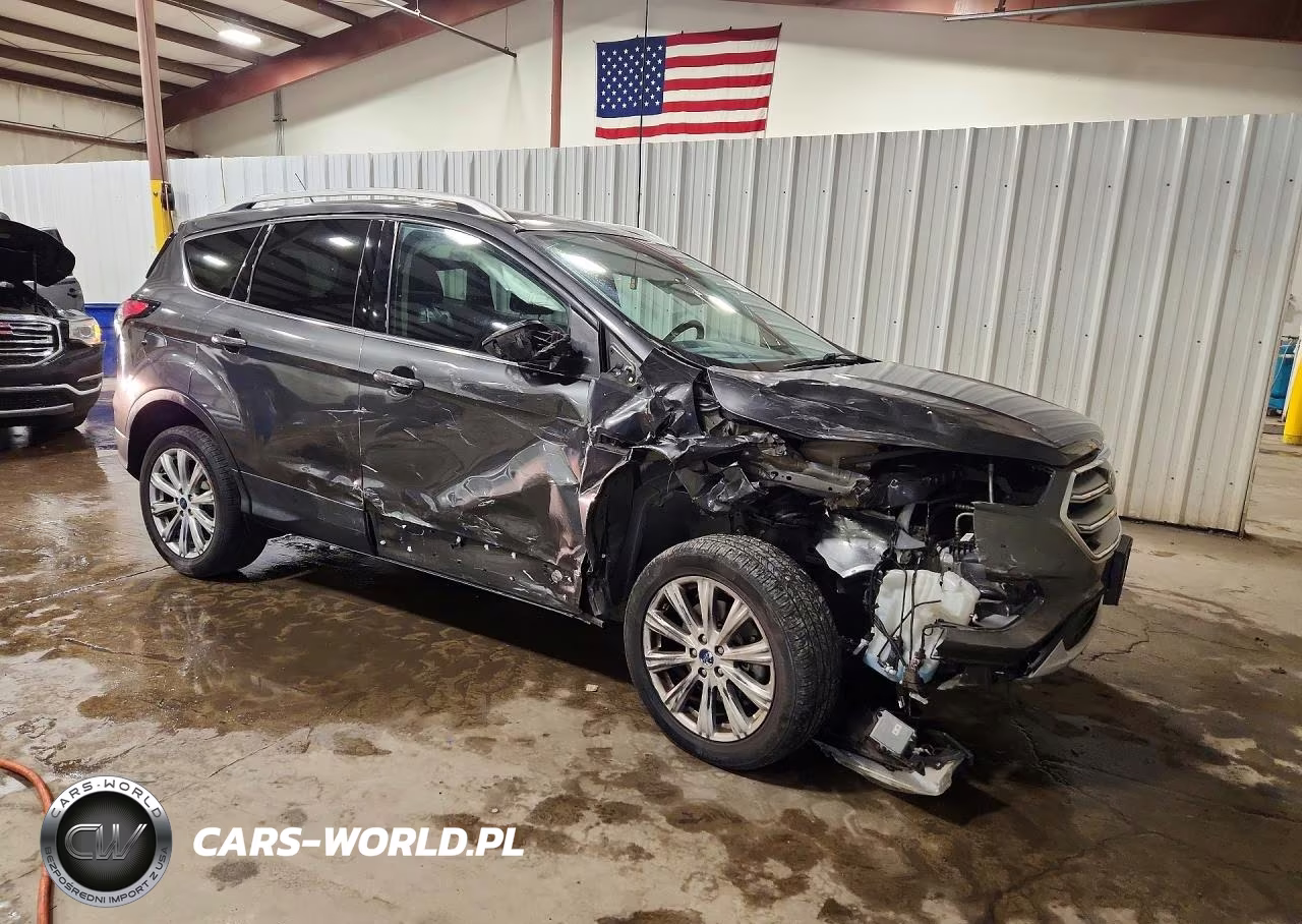 2017 Ford Escape Titanium VIN:1FMCU9J9XHUF09323 - 4