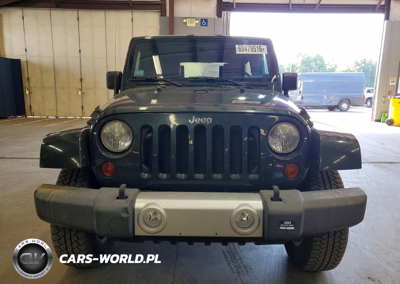 2010 Jeep Wrangler Unlimited Sahara VIN:1J4BA5H17AL167899 - 5