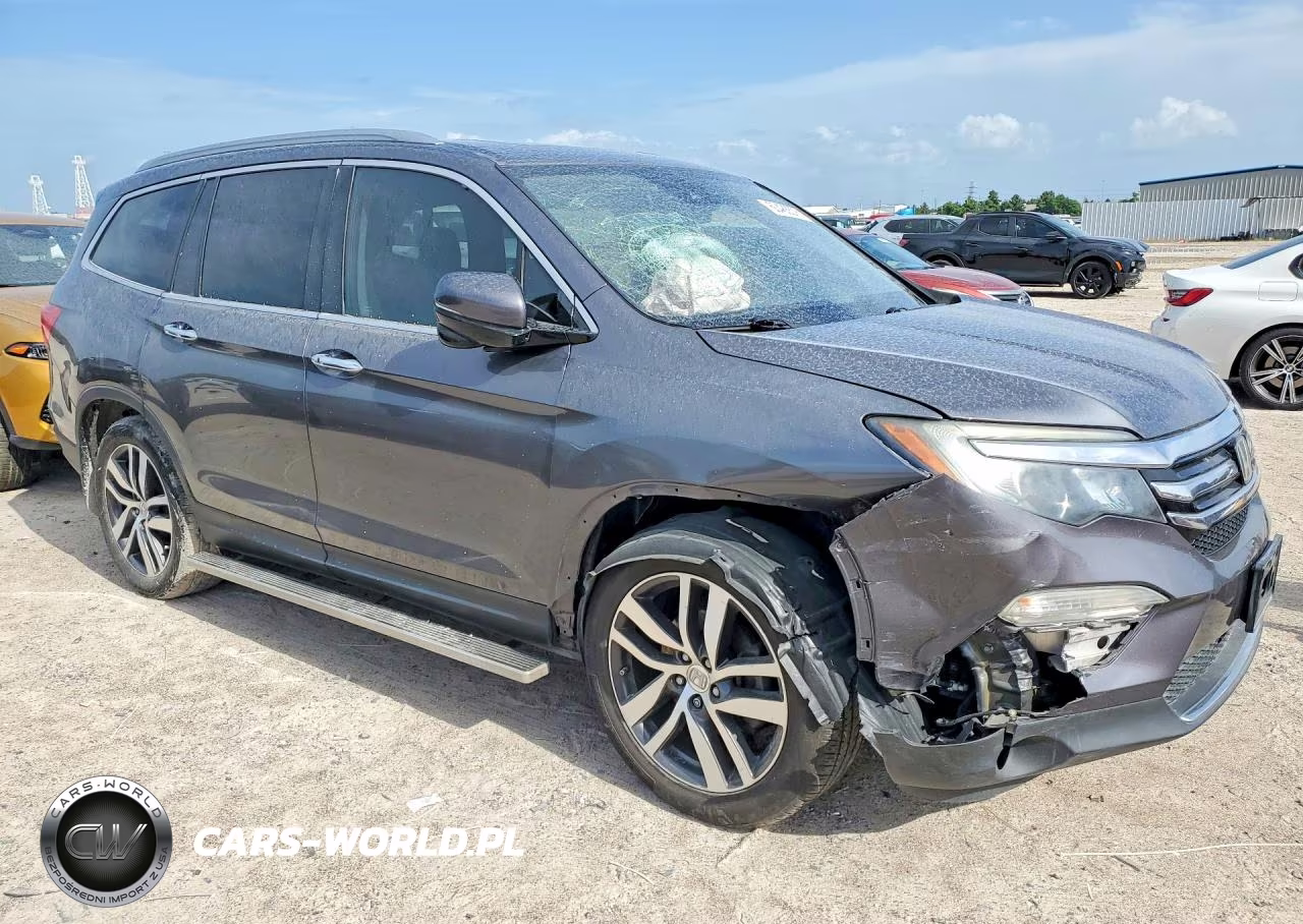 2017 Honda Pilot Touring VIN:5FNYF5H96HB045572 - 4