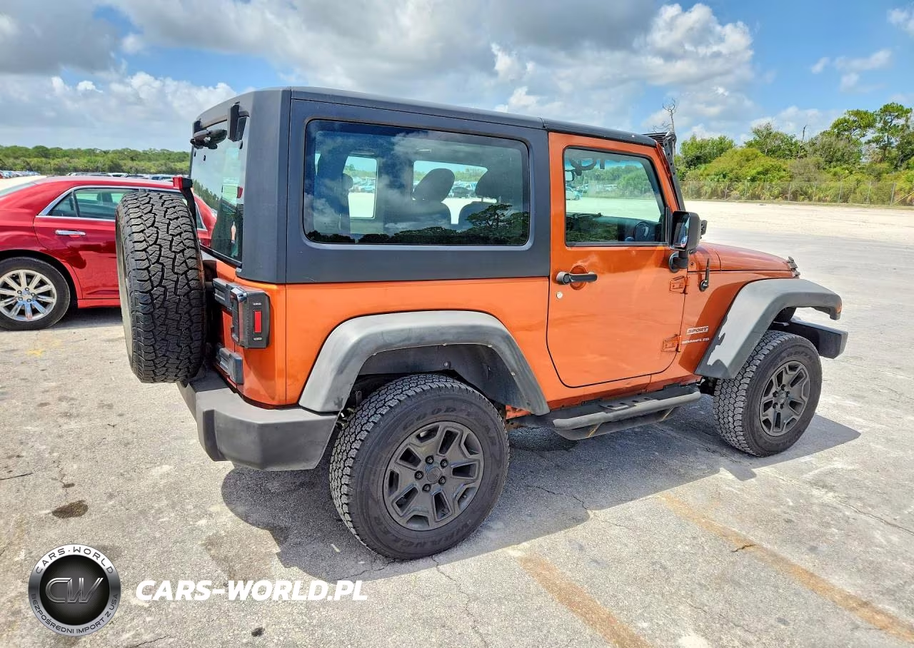 2011 Jeep Wrangler Sport VIN:1J4AA2D16BL574551 - 3
