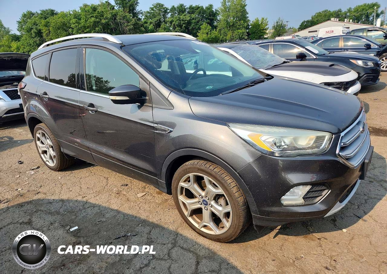 2017 Ford Escape Titanium VIN:1FMCU9J99HUA02123 - 4