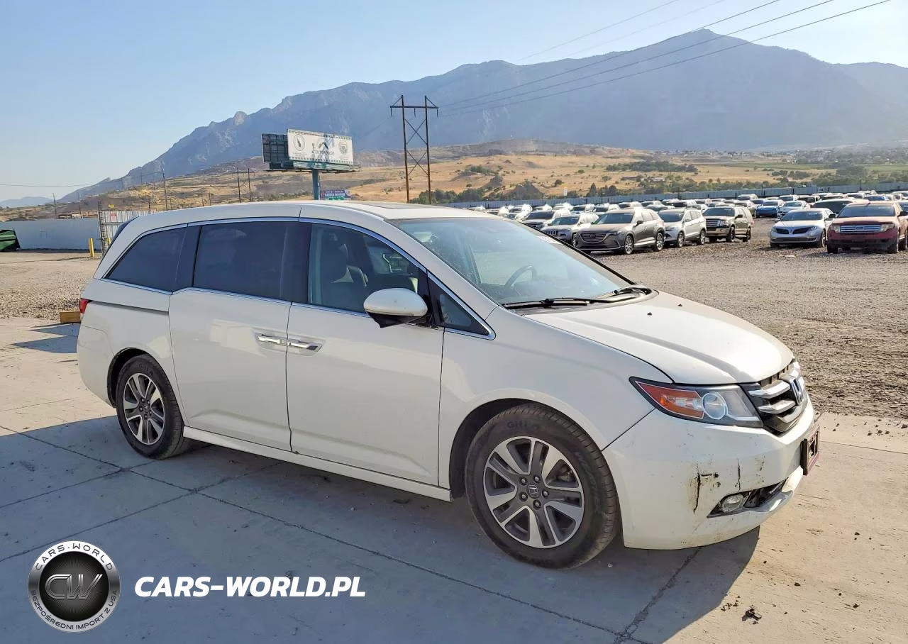 2014 Honda Odyssey Touring VIN:5FNRL5H90EB124387 - 4