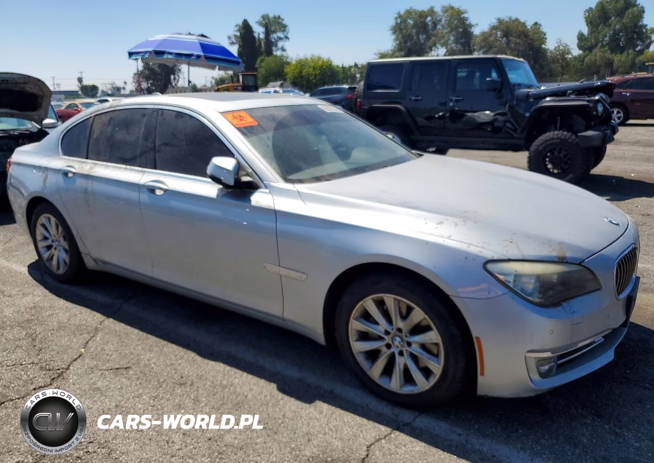 2015 BMW 740 I VIN:WBAYA6C52FGK16522 - 4