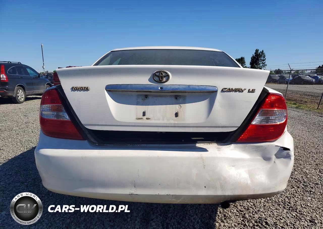 2002 Toyota Camry Le VIN:JTDBE32K520034738 - 6