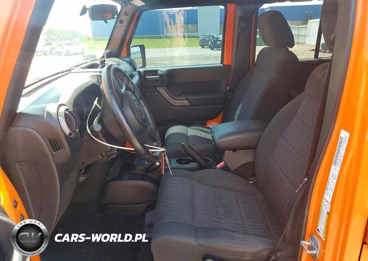 2012 Jeep Wrangler Unlimited Sport VIN:1C4BJWDG9CL214598 - 7