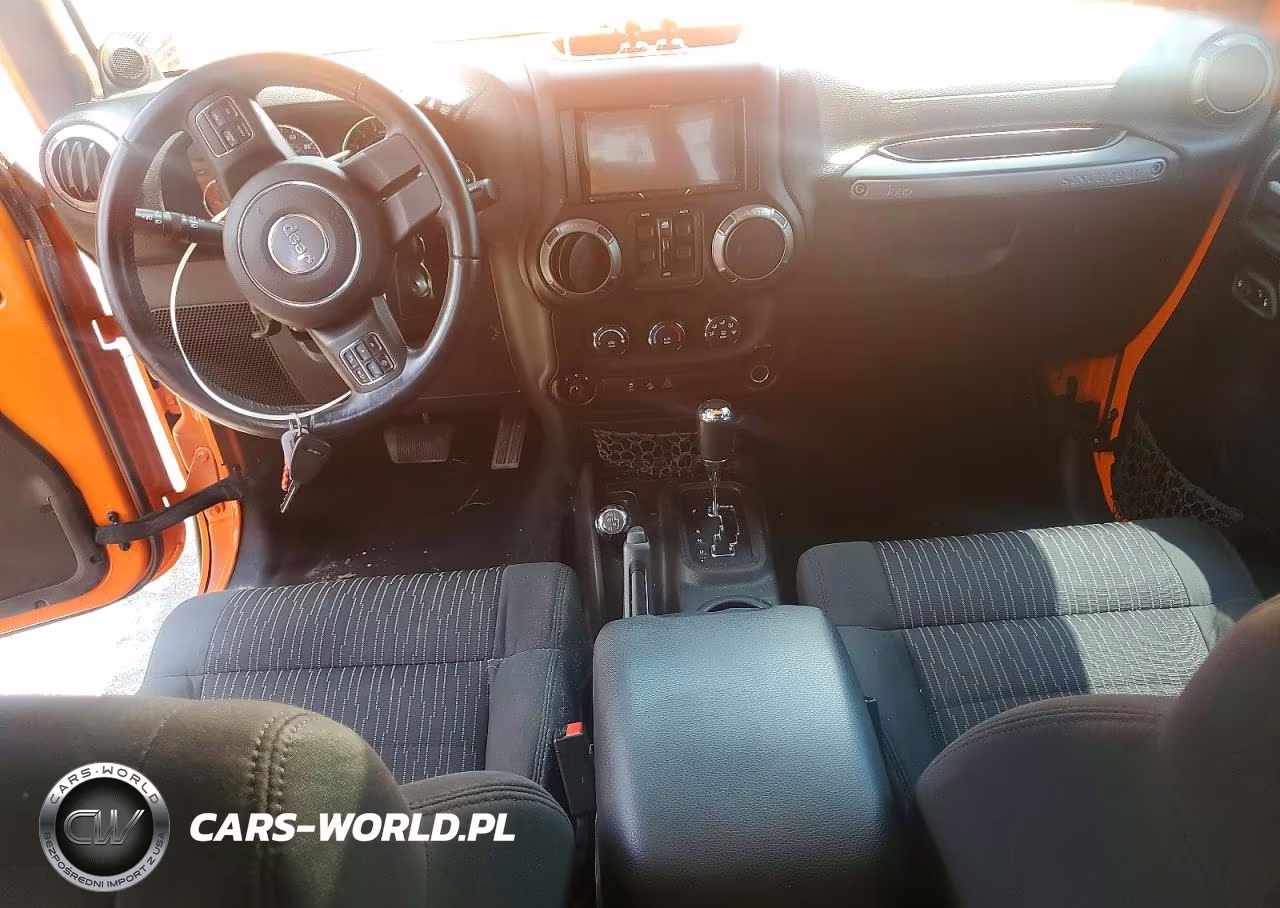 2012 Jeep Wrangler Unlimited Sport VIN:1C4BJWDG9CL214598 - 8