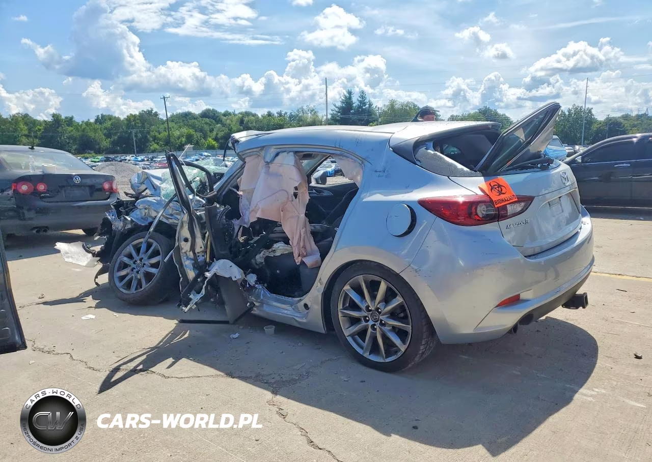 2018 Mazda 3 Touring VIN:3MZBN1L34JM180603 - 2