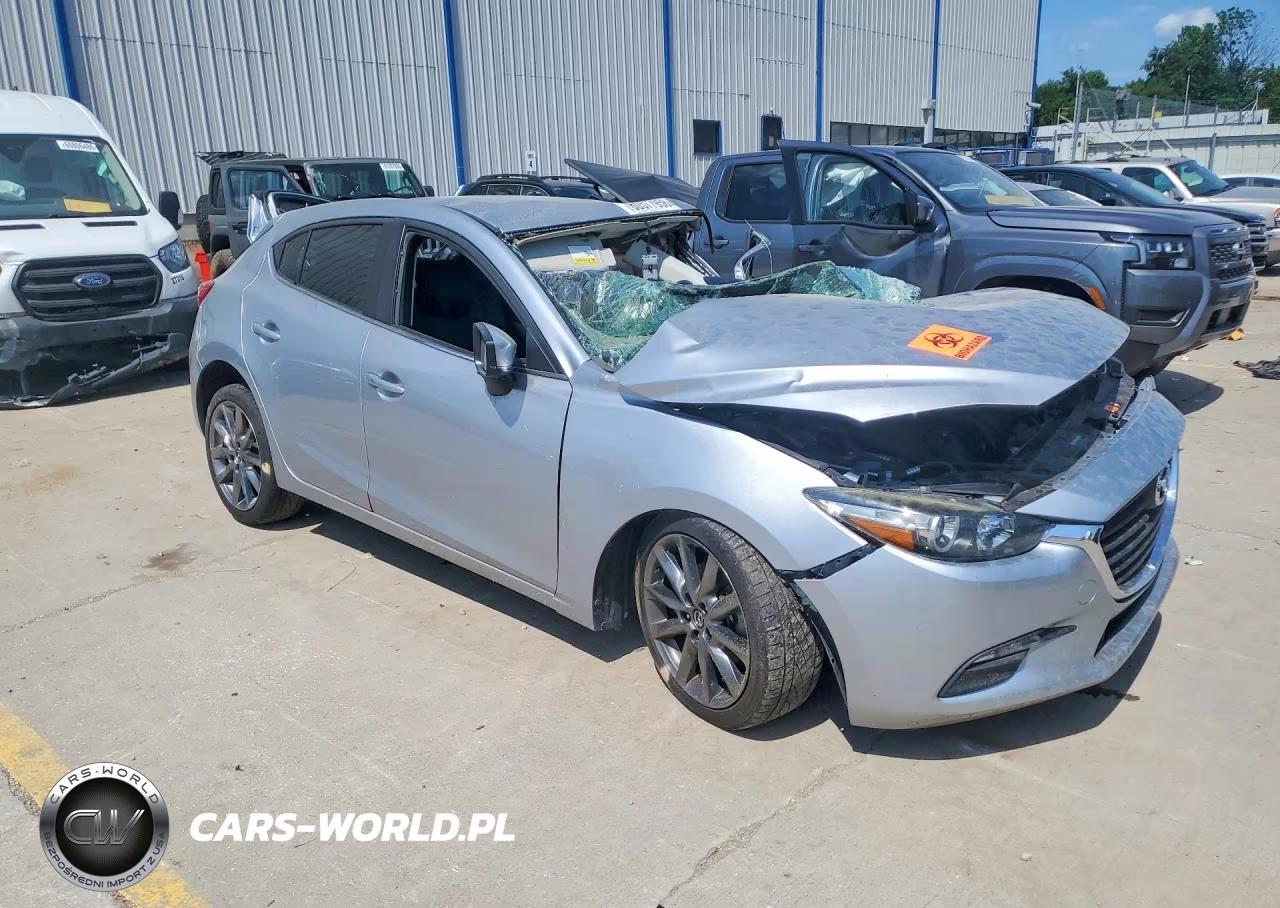 2018 Mazda 3 Touring VIN:3MZBN1L34JM180603 - 4