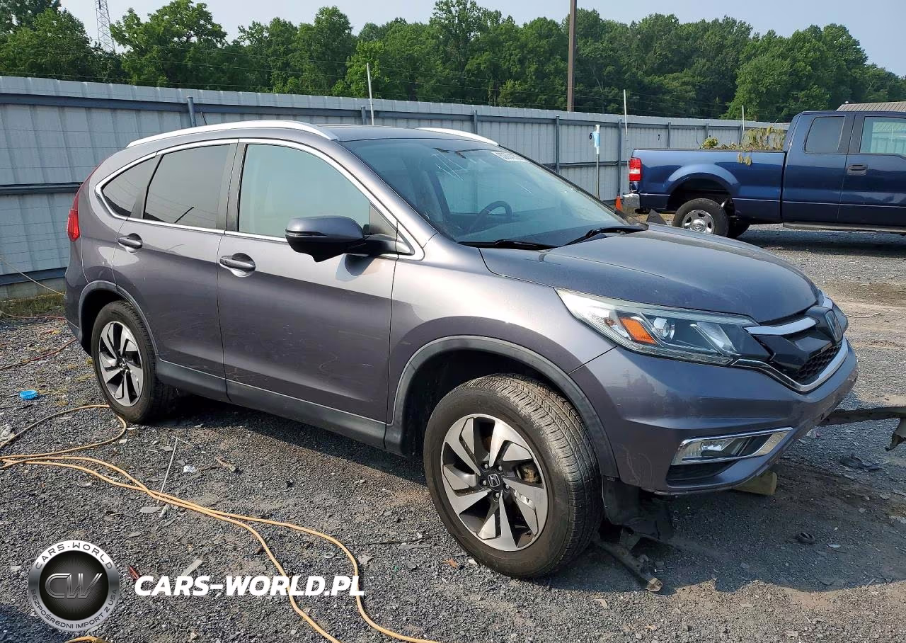 2015 Honda Cr-V Touring VIN:5J6RM4H93FL123864 - 4