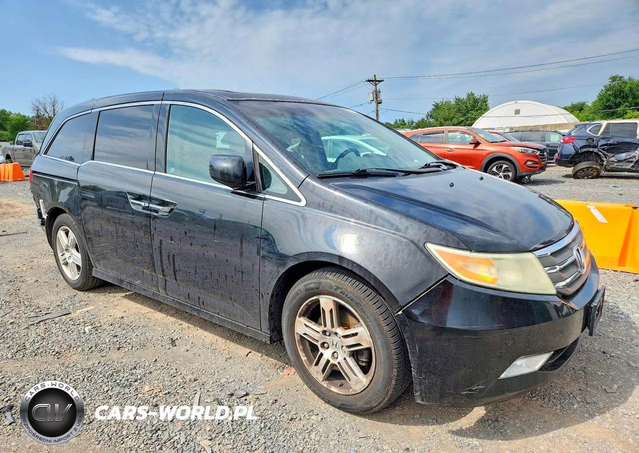 2011 Honda Odyssey Touring VIN:5FNRL5H99BB019908 - 4