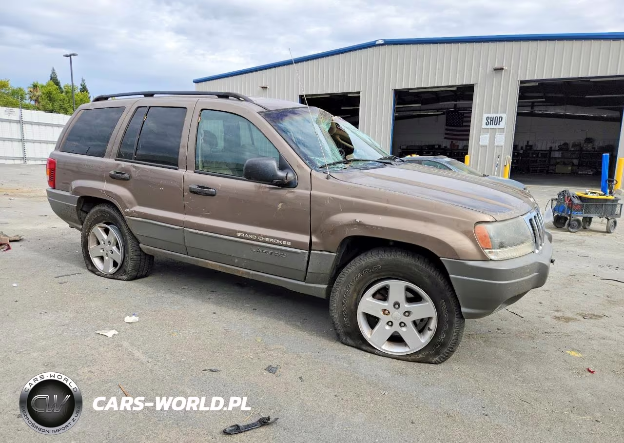 2002 Jeep Grand Cherokee Sport VIN:1J4GW38S12C219419 - 4