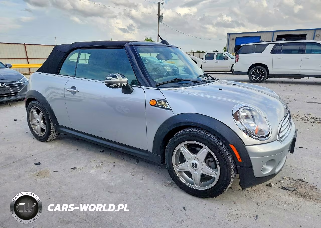 2009 Mini Cooper VIN:WMWMR33599TU96005 - 4